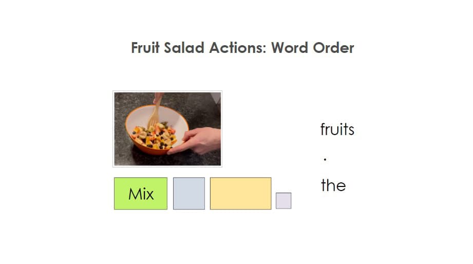 A person mixes fruit salad in a bowl. The words "fruits" and "the" are listed vertically, and colored boxes below the bowl are labeled "Mix" and are left blank for word order activity.