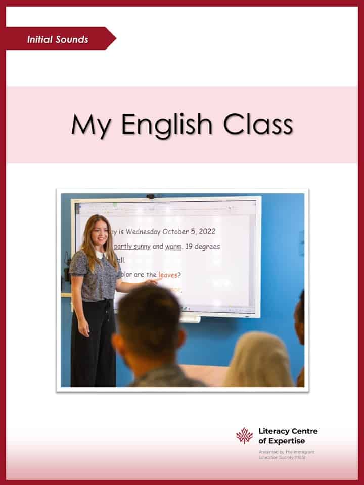 A teacher stands in front of a digital whiteboard displaying text, teaching reading skills to a group of students in a classroom. The slide is titled “My English Class” with the Literacy Centre of Expertise logo below, featuring engaging stories.